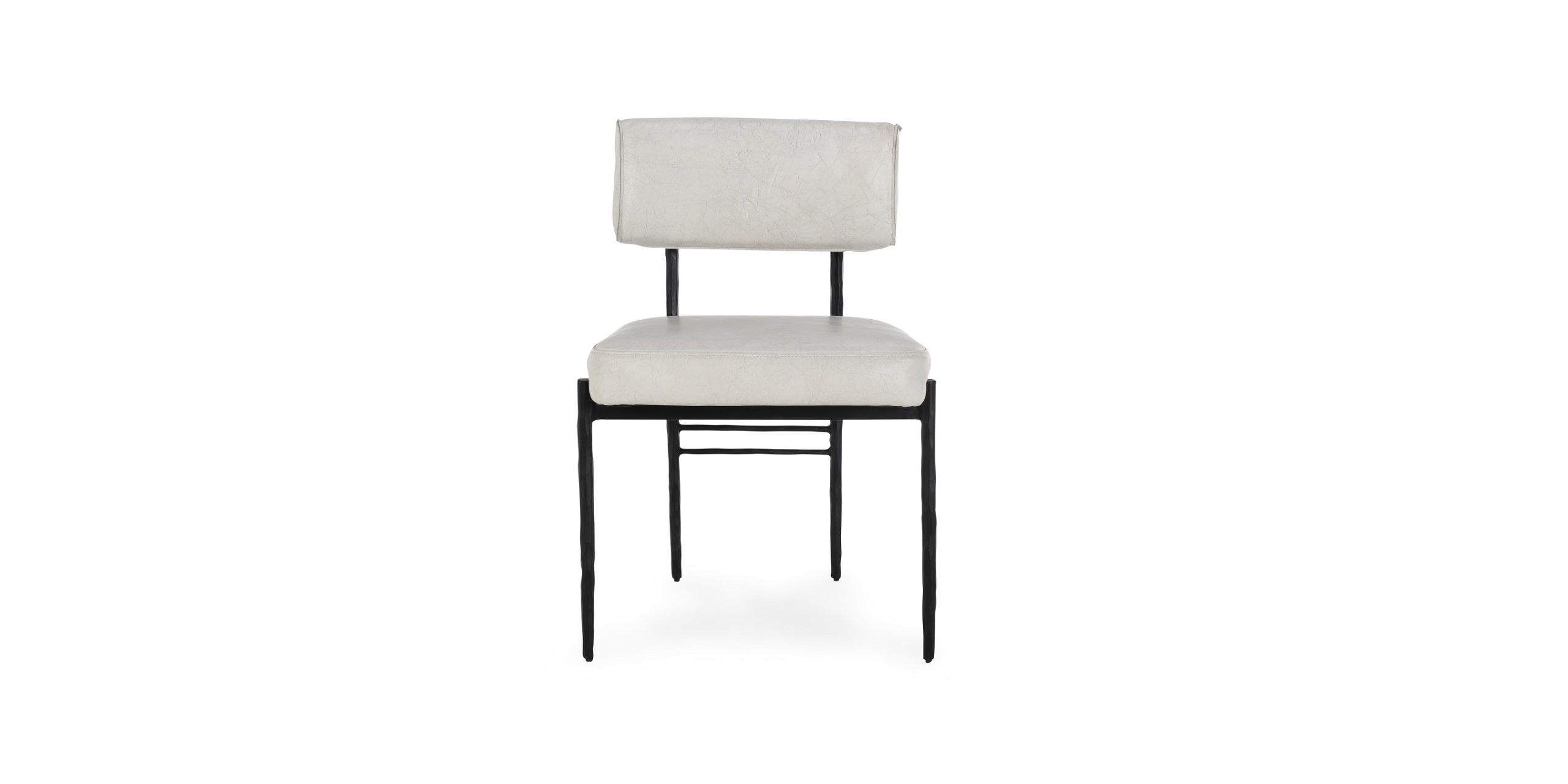 Sleek modern upholstered chair with black metal frame and light gray padding for versatile elegance.