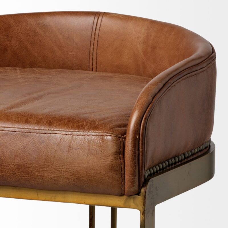 Luxurious brown leather chair with sleek metallic frame, perfect for modern and traditional interiors.
