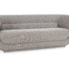 Stylish round sofa with soft contours, neutral upholstery, and ergonomic comfort for modern living.