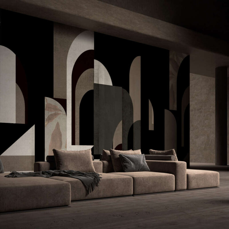 Elegant minimalist living room with abstract art, cozy sectional sofa, and warm wood flooring.