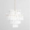 Sleek modern chandelier with icicle design, gold frame, and stunning light-reflecting elements.
