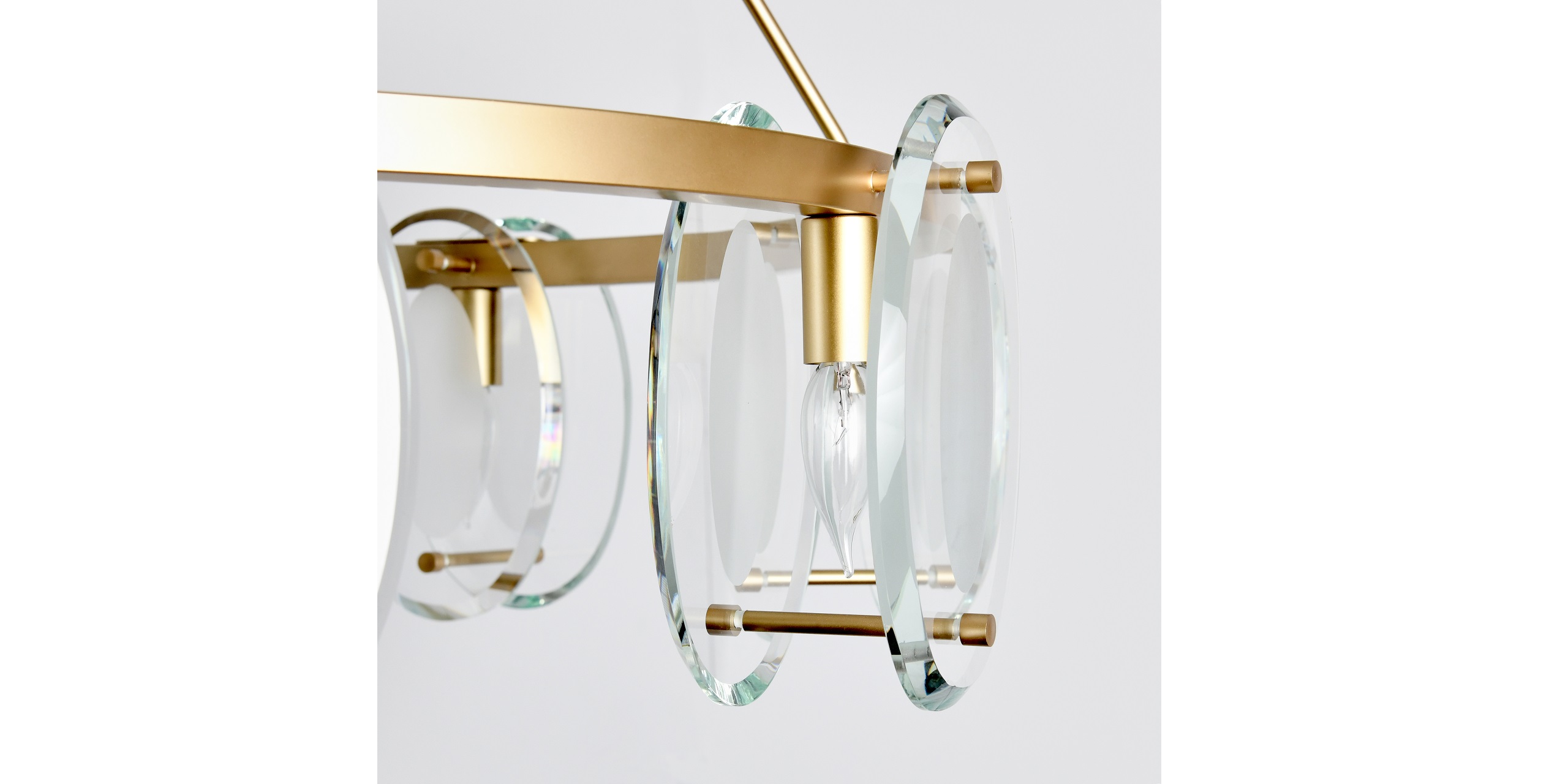 Sleek gold chandelier with glass discs, offering modern elegance and beautiful light reflections.
