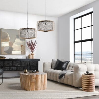 Stylish living room blending modern design with natural elements, featuring cozy furniture and vibrant decor.