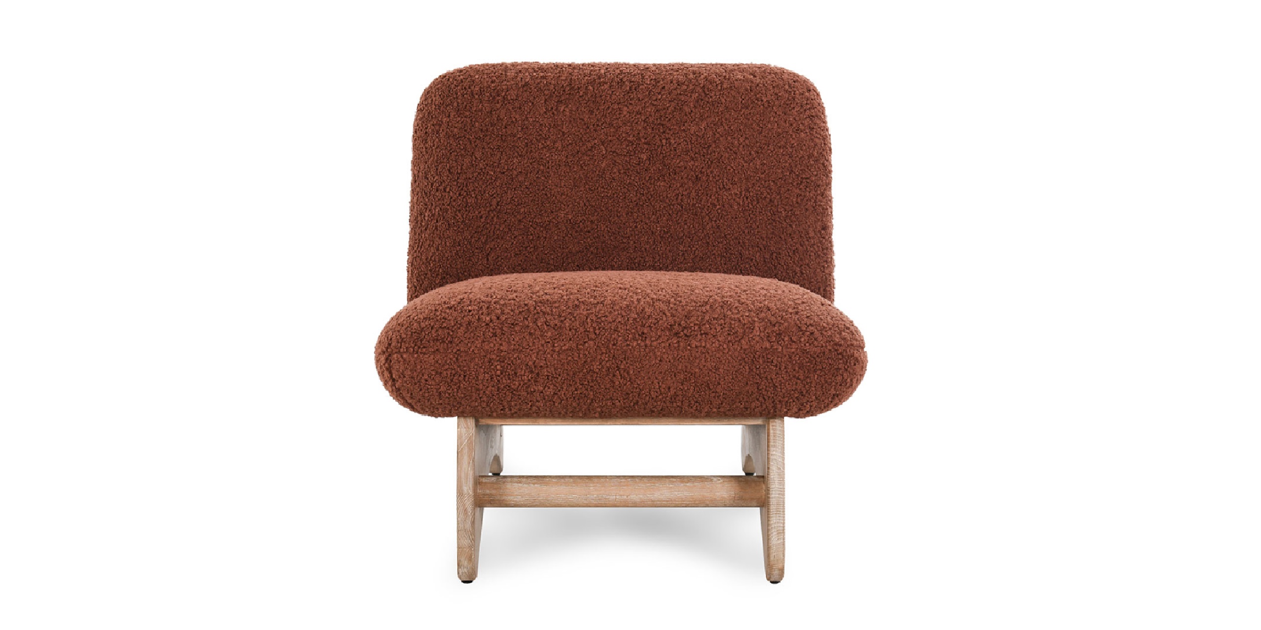Cozy rust-colored armchair with plush fabric and light wood frame for modern living spaces.
