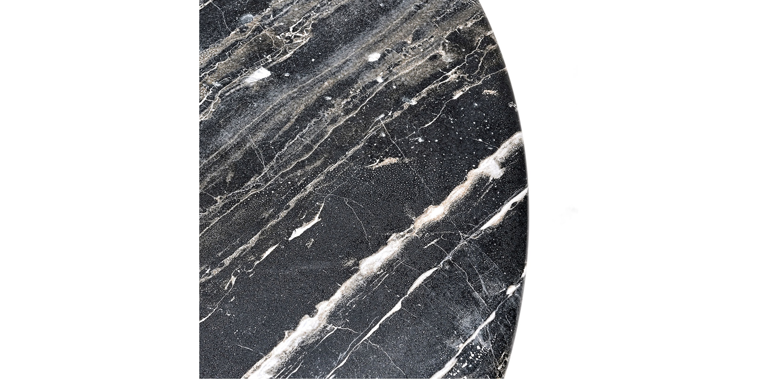 Close-up of elegant black marble with intricate white veining for luxurious design applications.