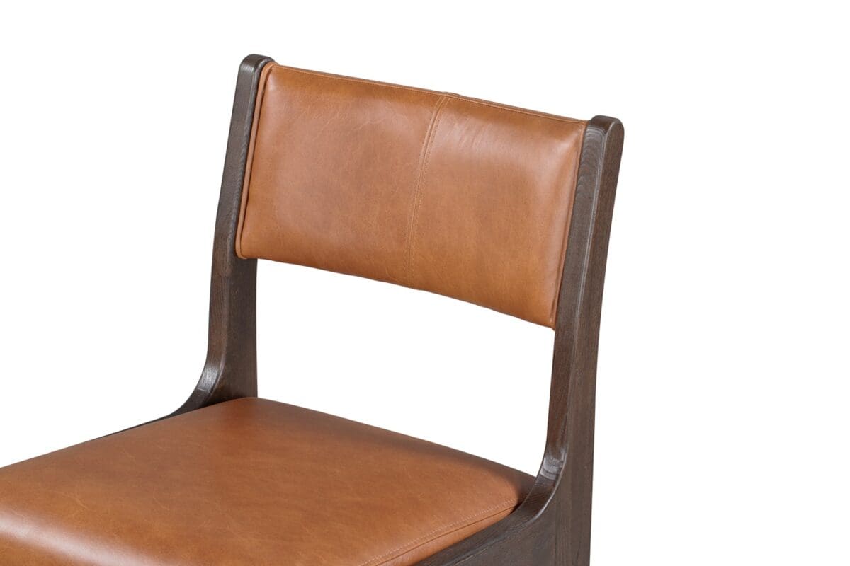 Elegant wood and leather chair perfect for modern dining and stylish home office spaces.