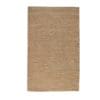 Elegant woven area rug in warm beige, perfect for cozy interiors and versatile decor styles.