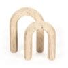 Stylish minimalist arch sculptures in light stone texture, perfect for contemporary decor.