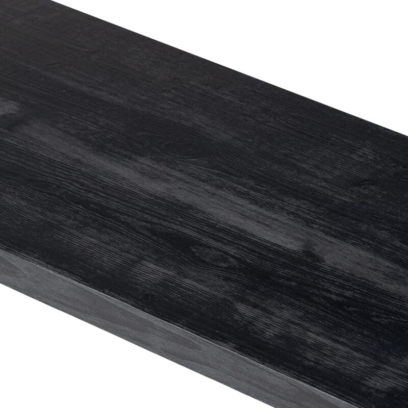 Modern black wood shelf with smooth finish and subtle grain, perfect for stylish decor.