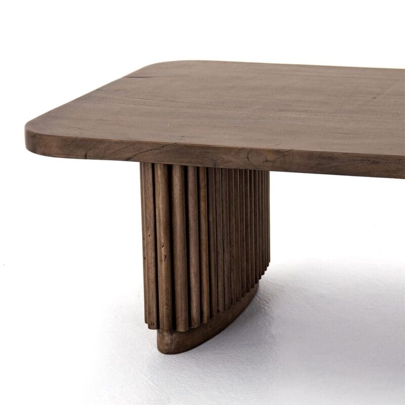 Stylish modern wood coffee table with unique slat design and earthy tones, perfect for any decor.