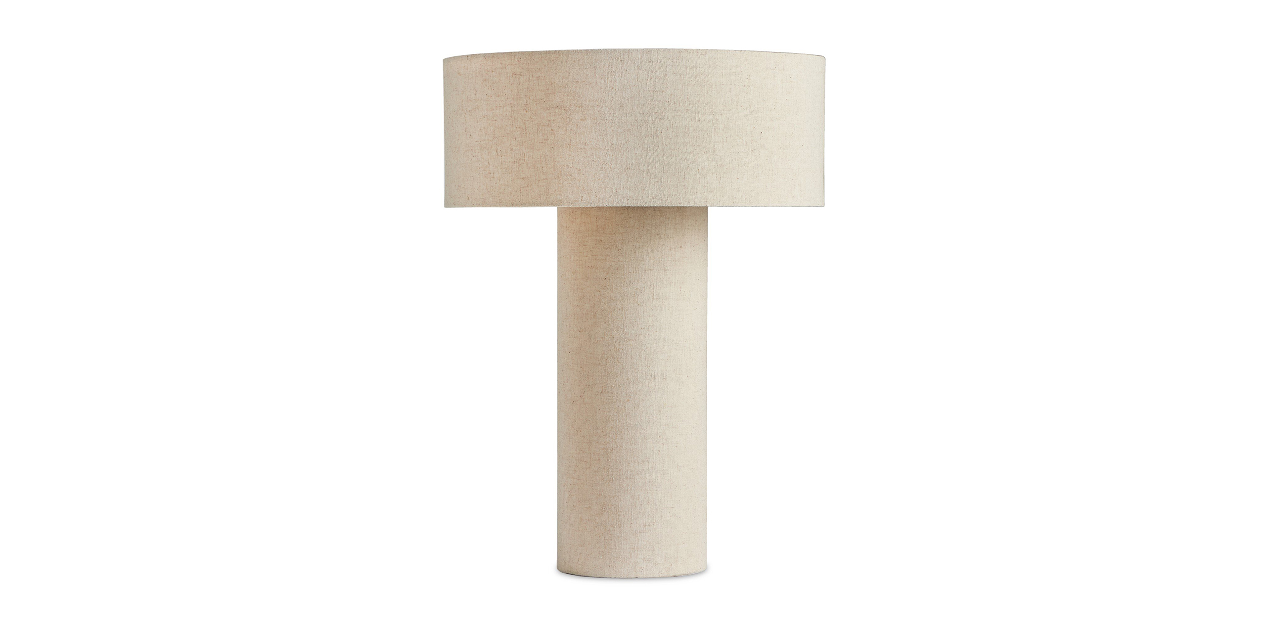 Sleek modern table lamp with textured design, ideal for elegant interiors and functional lighting.