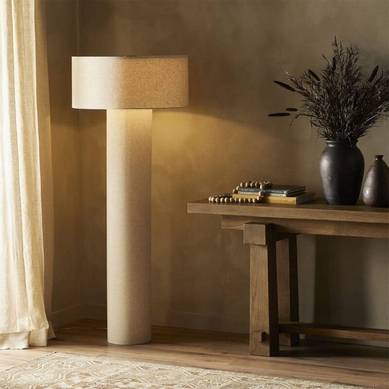 Warm and inviting minimalist living room with cozy lighting and elegant decor elements.