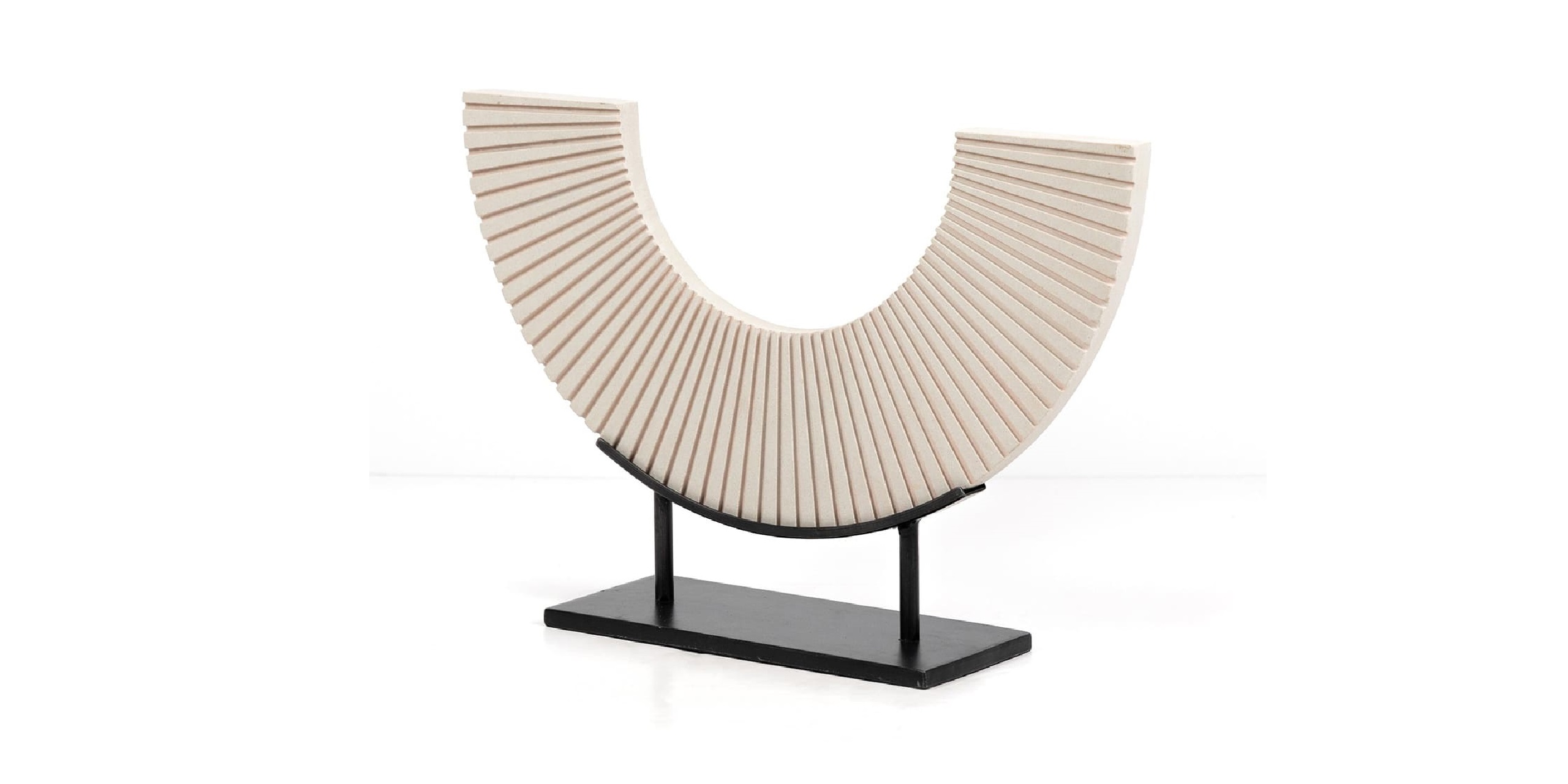 Modern crescent sculpture in neutral tones enhances elegance and sophistication in any space.