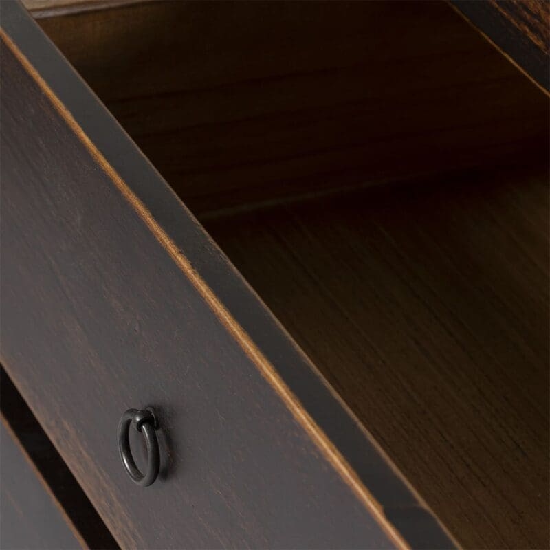 Stylish dark wood drawer with sleek metal pull and organized, uncluttered interior.