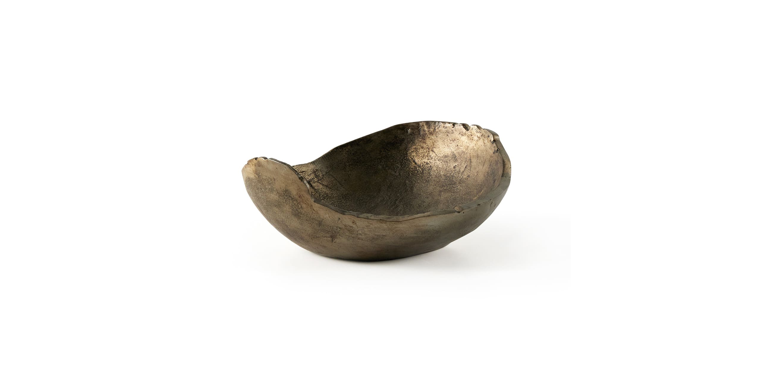 Artisan metallic bowl with organic design, blending elegance and functionality for any decor.
