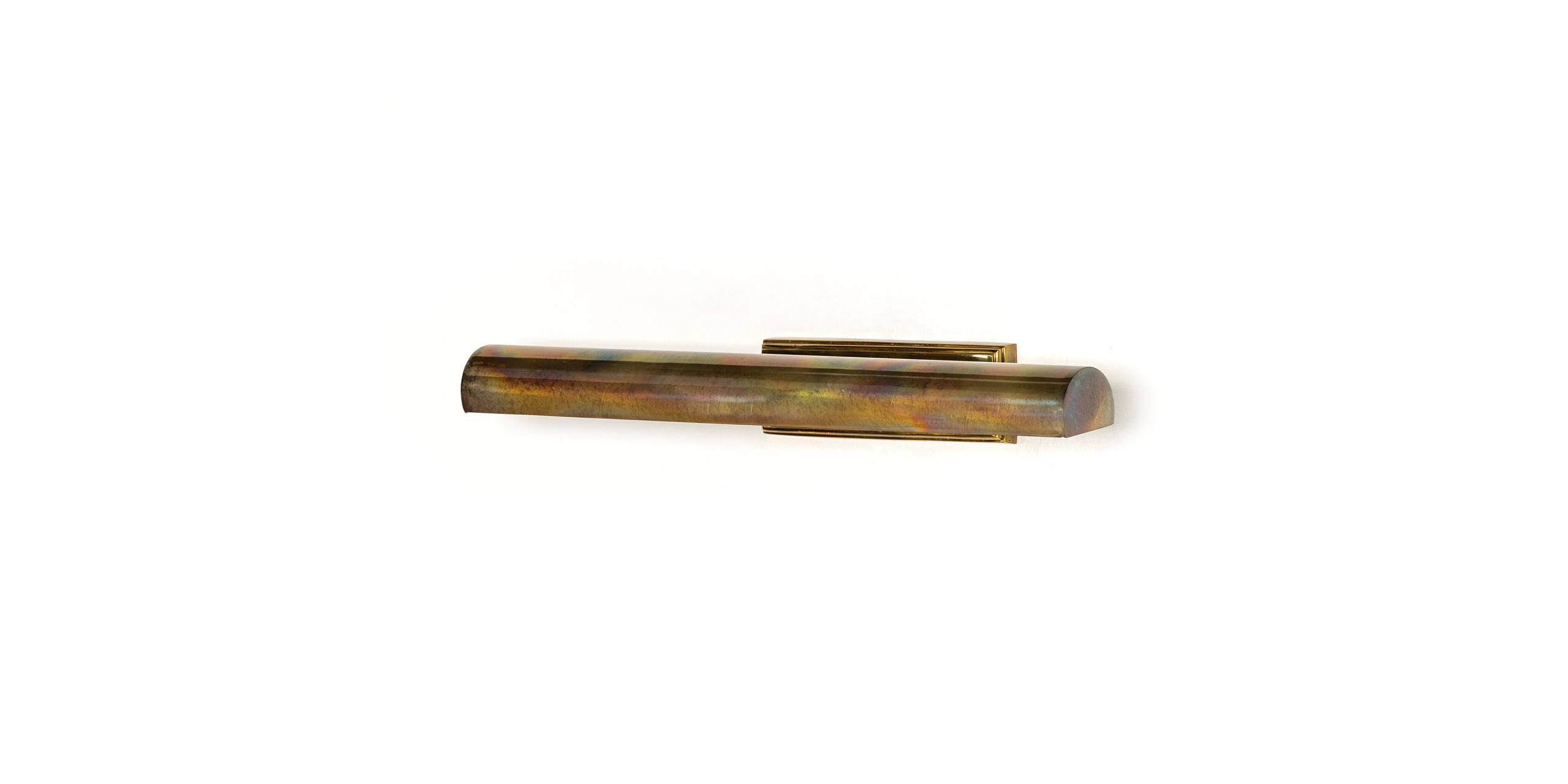 Sleek metallic stylus with iridescent finish and gold clip on a white background.