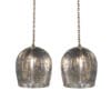 Stylish bell-shaped pendant lights with intricate glass shades and warm metallic accents for elegant interiors.