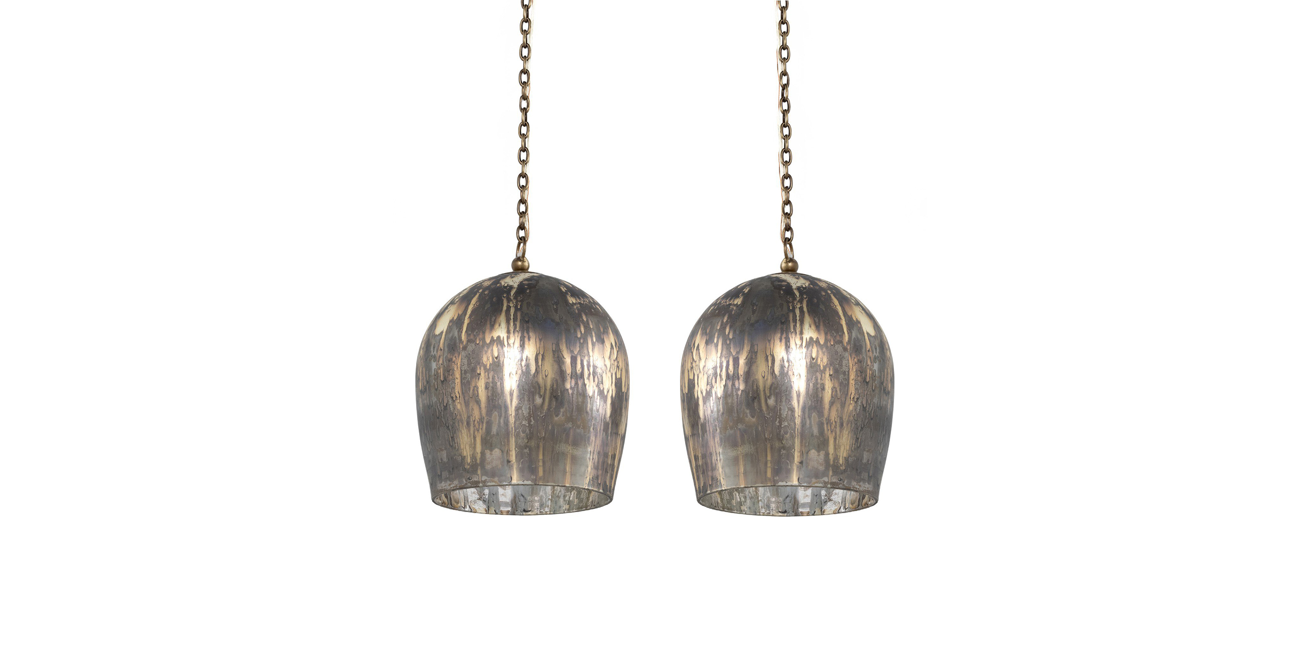 Stylish bell-shaped pendant lights with intricate glass shades and warm metallic accents for elegant interiors.