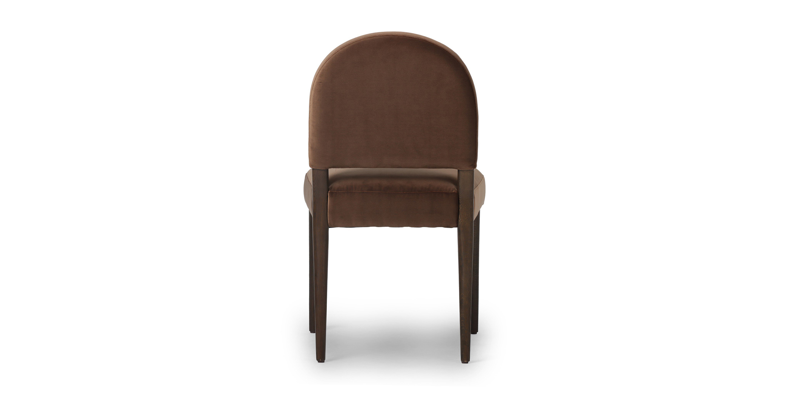 Modern rounded back chair in brown velvet with sturdy wood legs for versatile interior style.