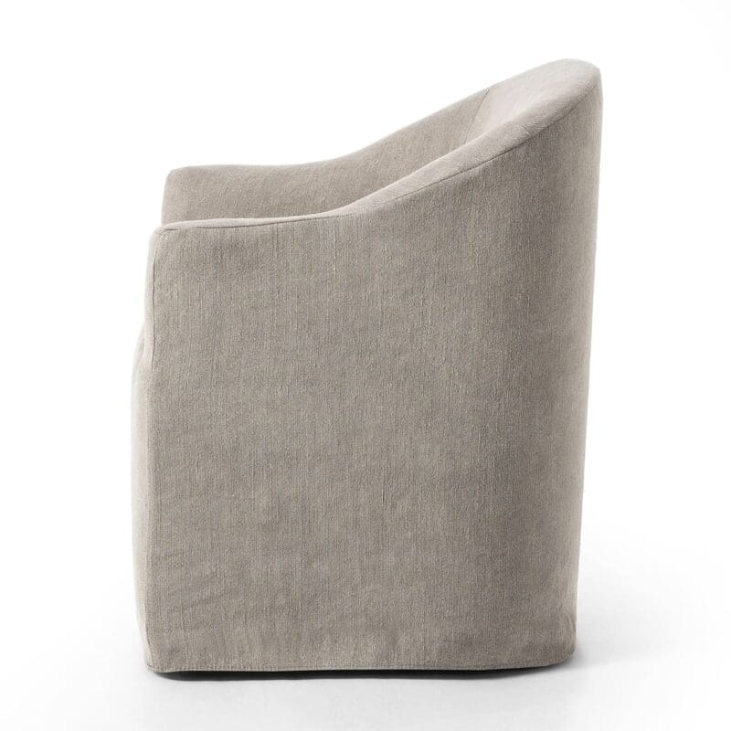 Contemporary light gray accent chair with a curved design, perfect for versatile interior decor.