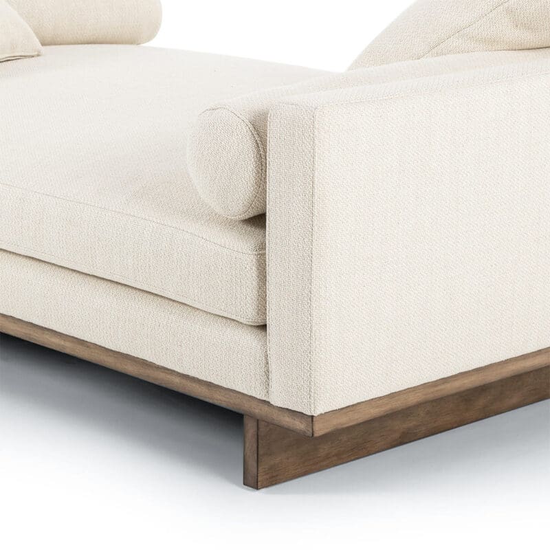 Elegant cream sofa blends modern design with comfort, perfect for stylish living spaces.