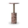 Sophisticated marble and brass side table with a stylish circular design and textured base.