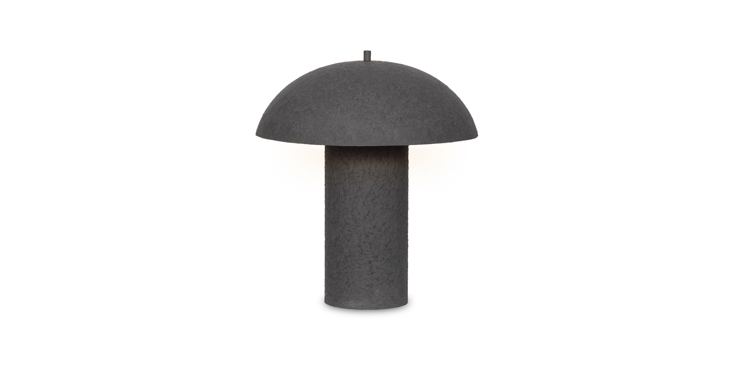 Sleek black dome lamp with textured base, perfect for modern and stylish interiors.
