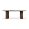 Sleek dark wood oval dining table with architectural support, perfect for modern dining spaces.