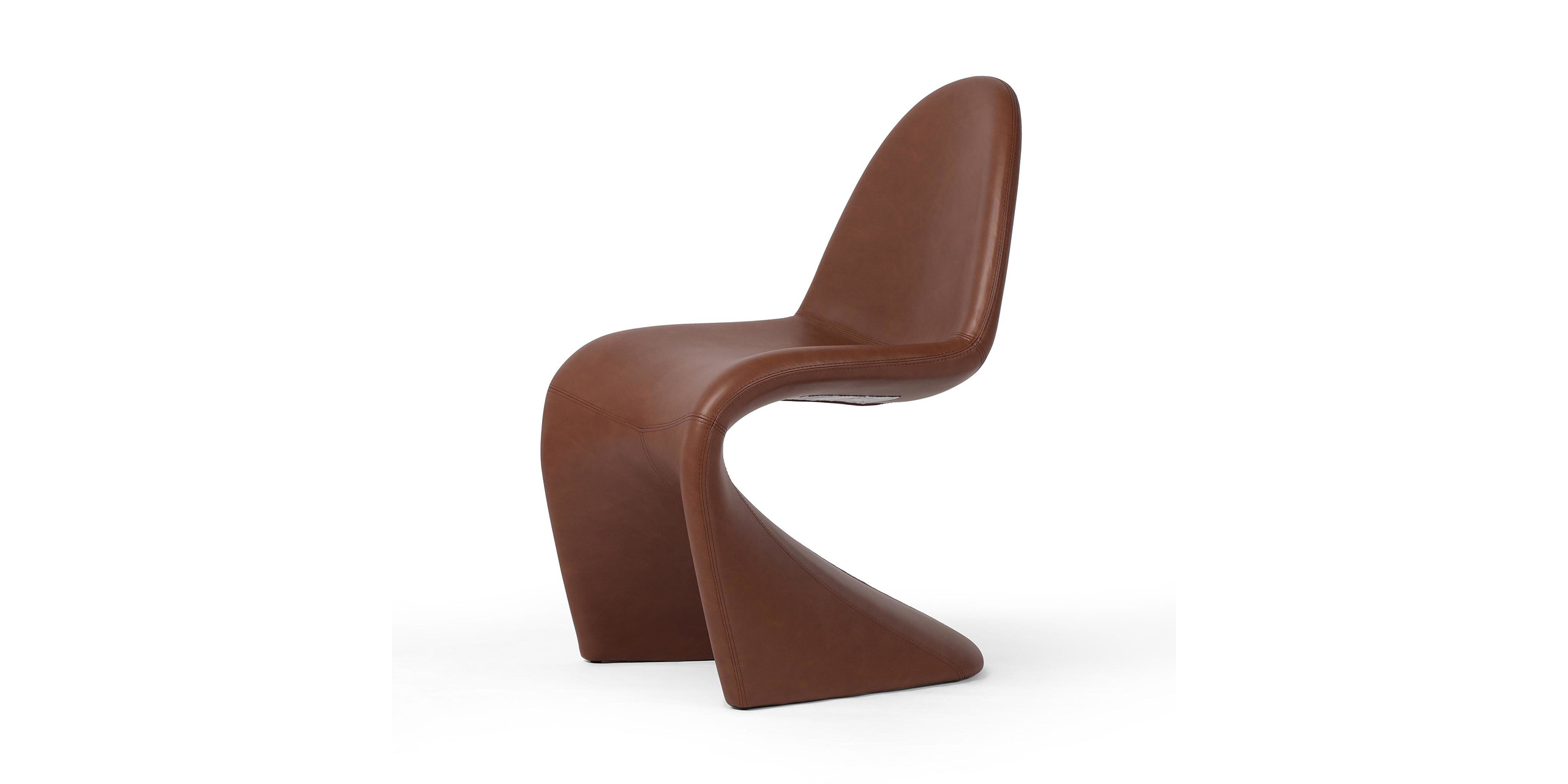 Sleek modern sculptural chair in rich brown, blending comfort with artistic elegance for contemporary spaces.