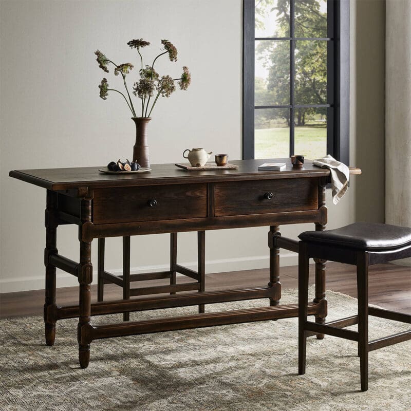 Cozy rustic table with dried flowers and natural light, perfect for gatherings and relaxation.
