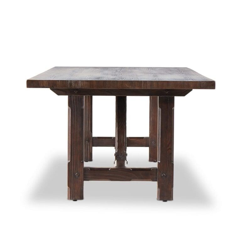Sturdy rustic wooden table with deep-brown planks, ideal for cozy living spaces.