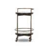 Chic brass-finished serving cart with circular shelves, ideal for entertaining and stylish home decor.