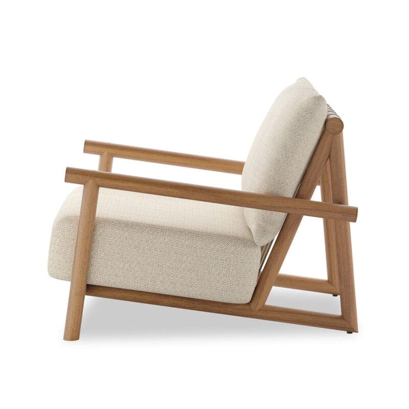 Sleek modern chair with light wood frame and soft neutral upholstery for stylish interiors.