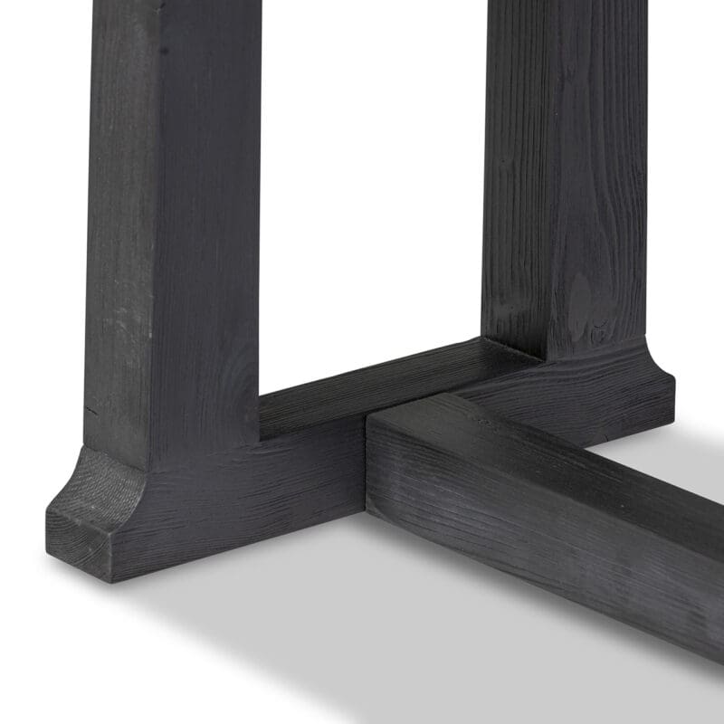 Modern wooden furniture detail showcasing elegant design and exquisite craftsmanship in rich, dark finish.