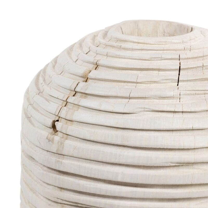 Artisan wooden vase with layered design, showcasing natural grain and unique character for decor.
