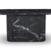 Elegant black marble oval dining table with ribbed base and striking white veining.