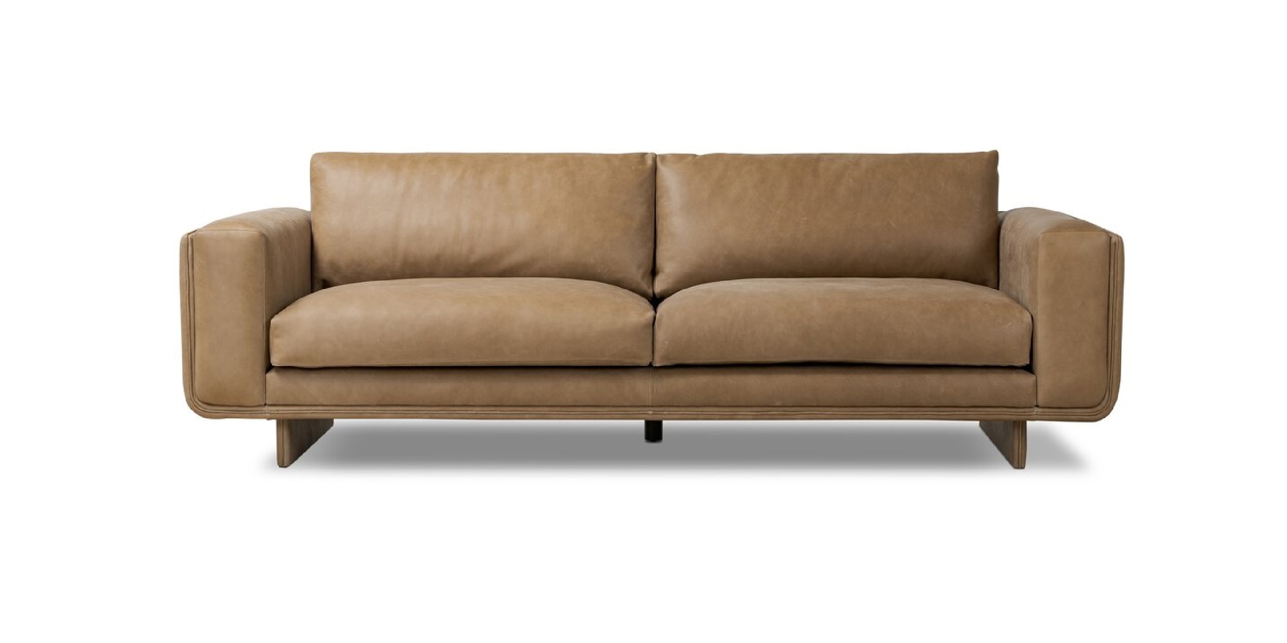 Sleek brown leather sofa with minimalist design and plush cushions for modern interiors.