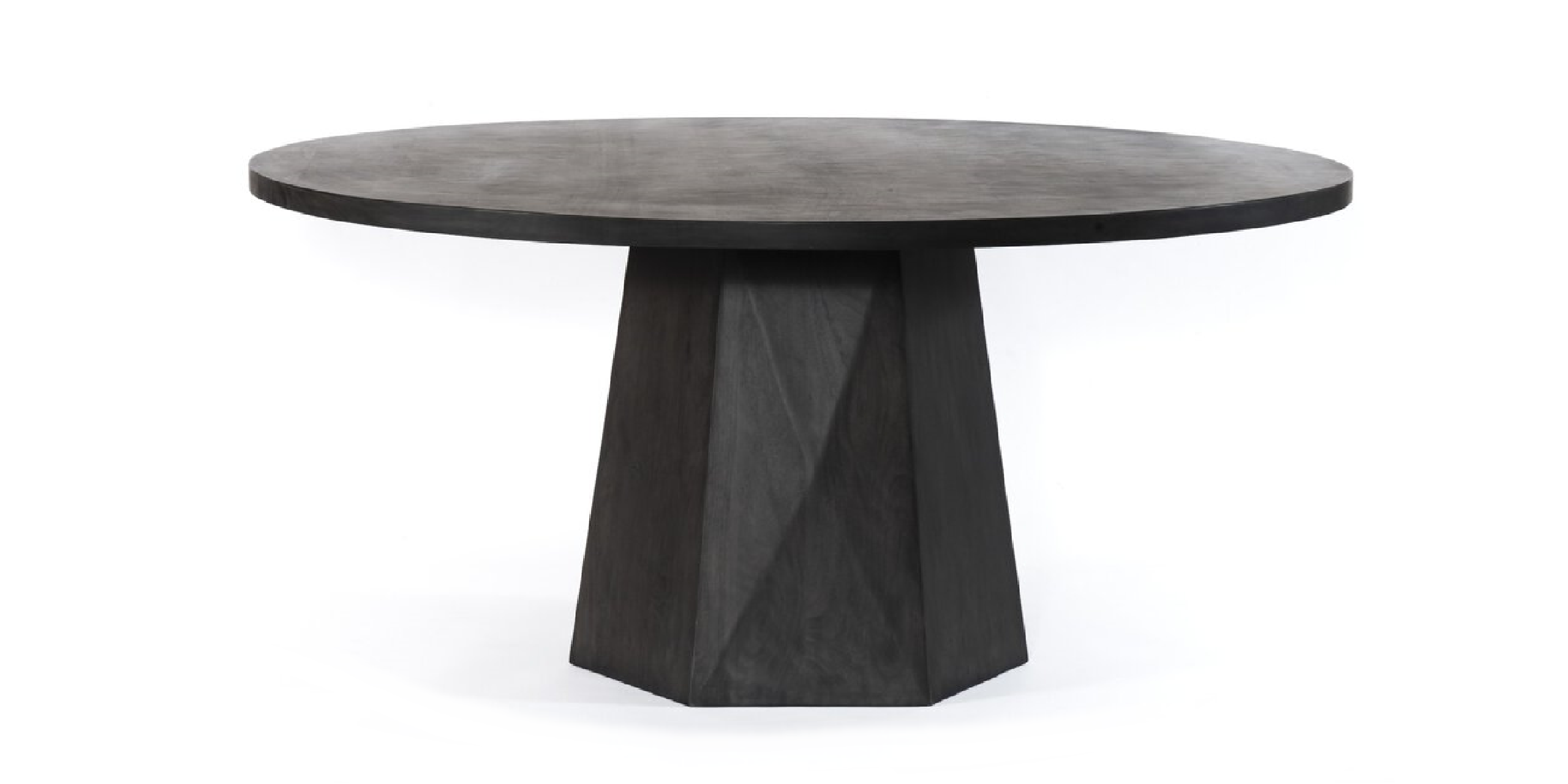 Stylish black round dining table with geometric base, perfect for modern dining spaces.
