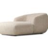 Minimalist chaise lounge in beige, designed for comfort and style in modern interiors.