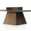 Elegant minimalist table with dark wood finish and integrated cable management for modern living spaces.