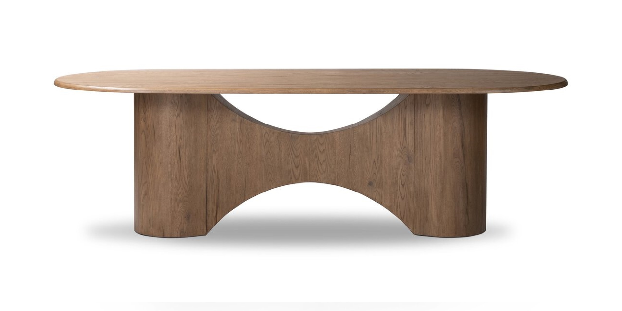 Sleek oval wooden dining table with a unique sculptural base for modern elegance.