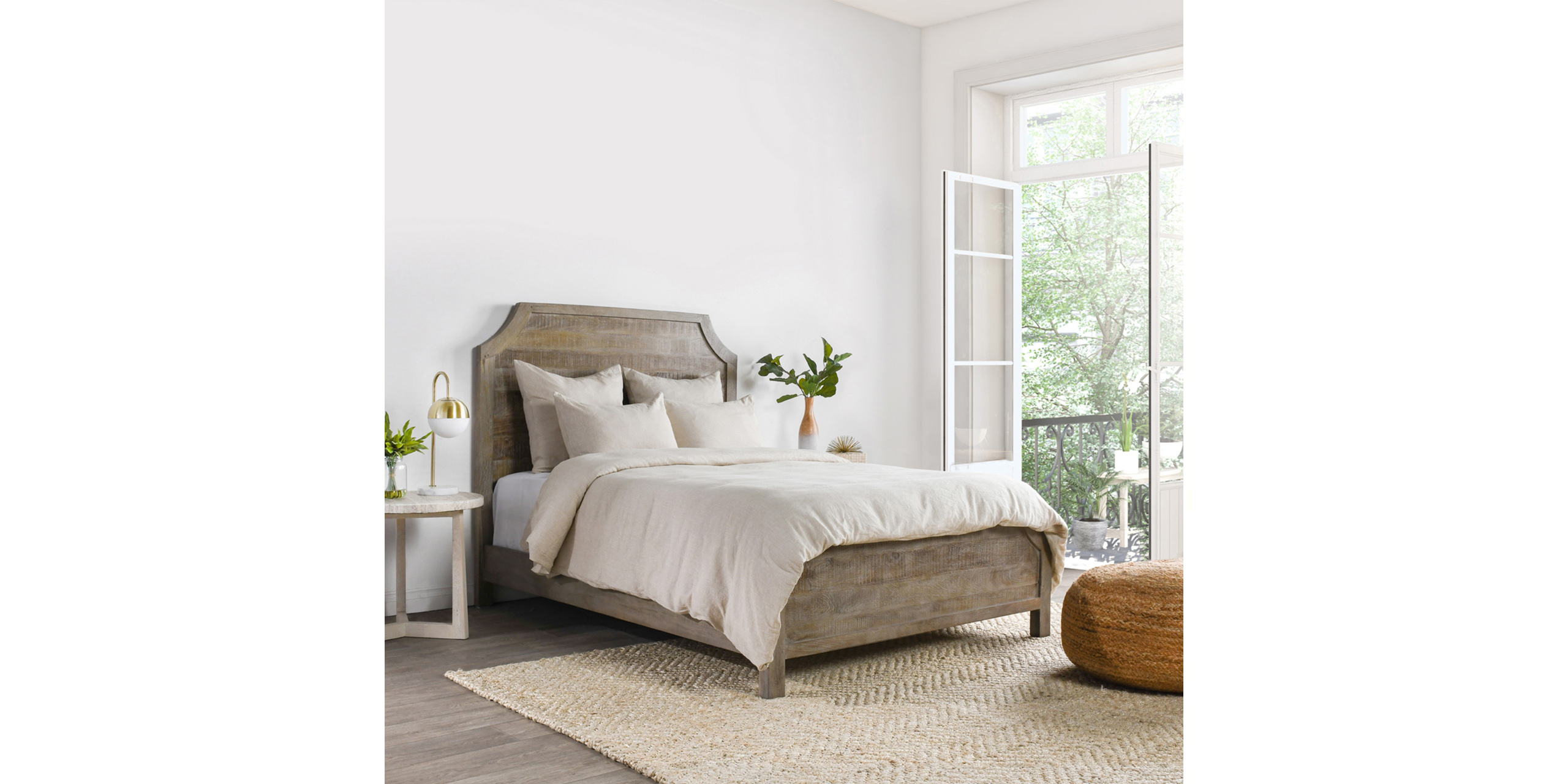 Cozy rustic bedroom retreat with natural light and inviting decor for ultimate relaxation.