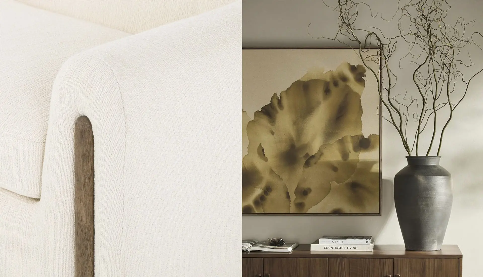 Elegant modern interior with cream couch, abstract artwork, and natural textures for inviting design.