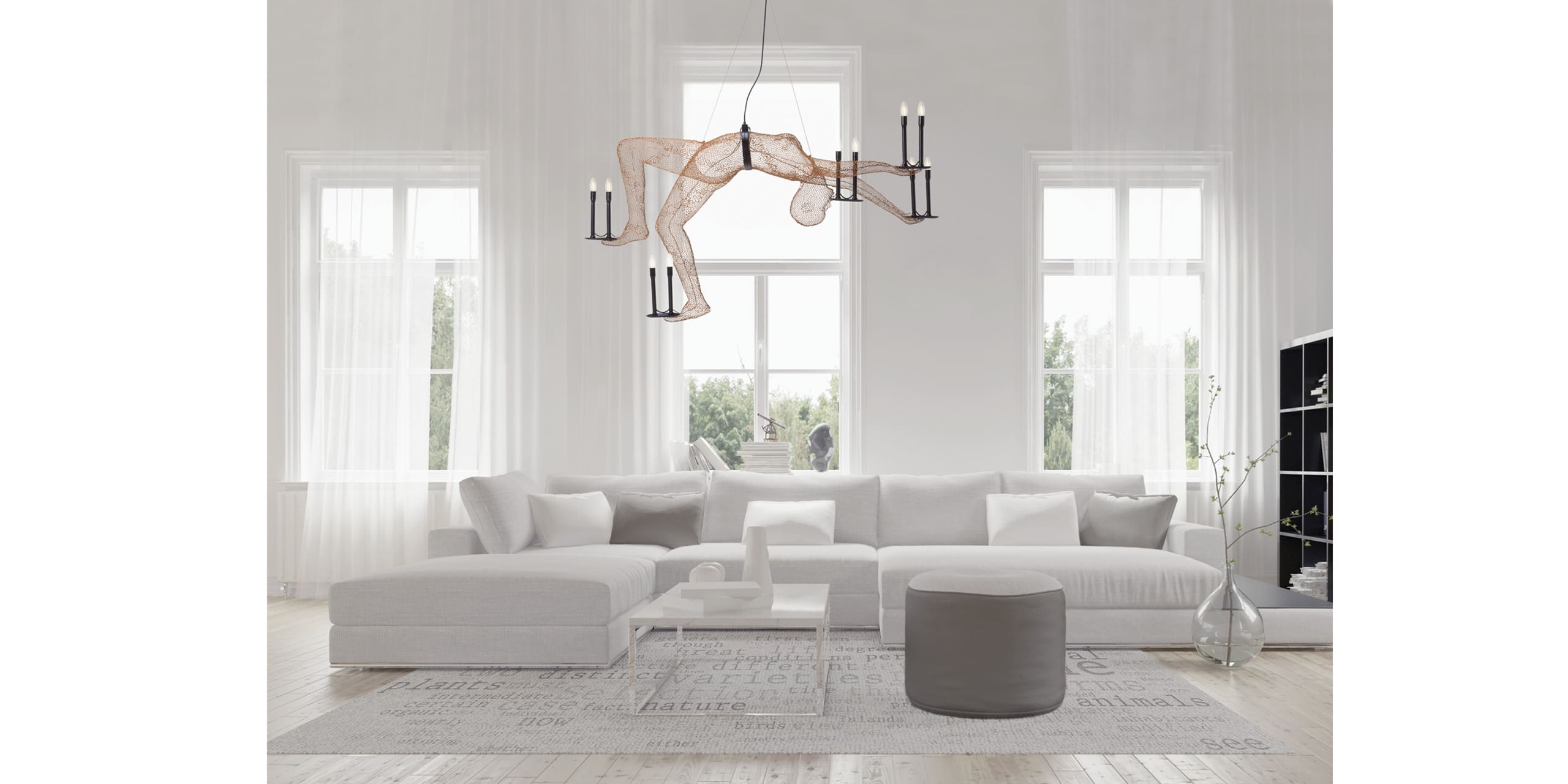 Stylish minimalist living room with gray sofa, unique chandelier, and abundant natural light.