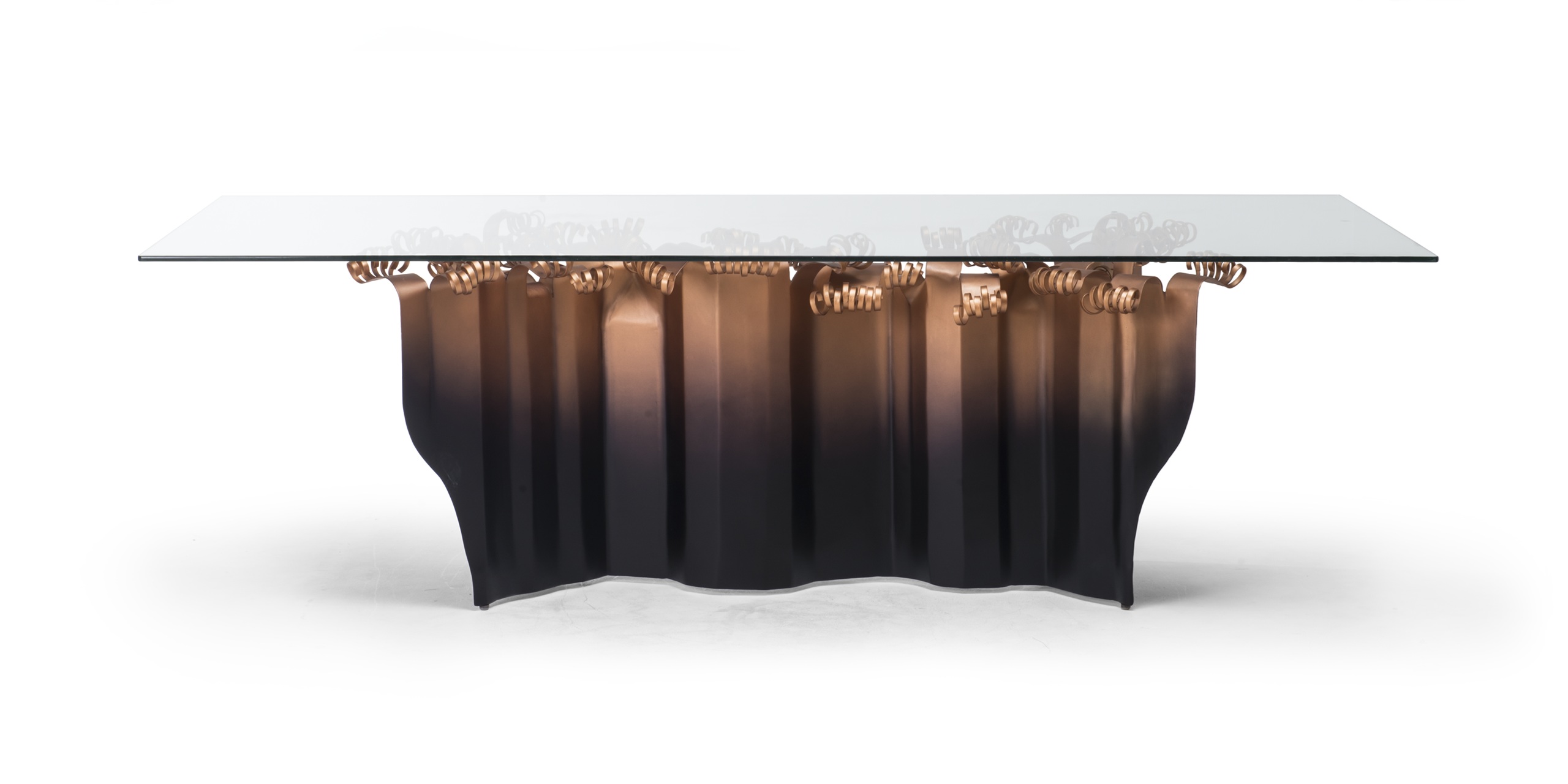 Sculptural wave-designed dining table with glass top and textured dark base for modern interiors.