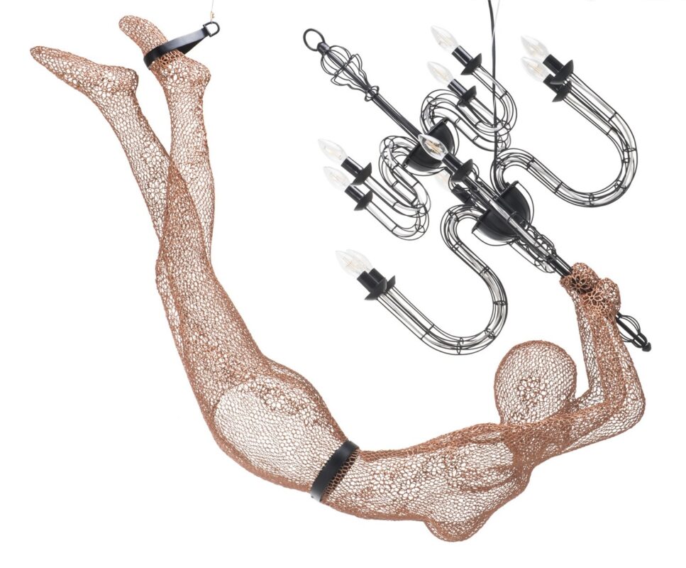 Copper diving figure art with modern chandelier, showcasing dynamic light and movement in design.